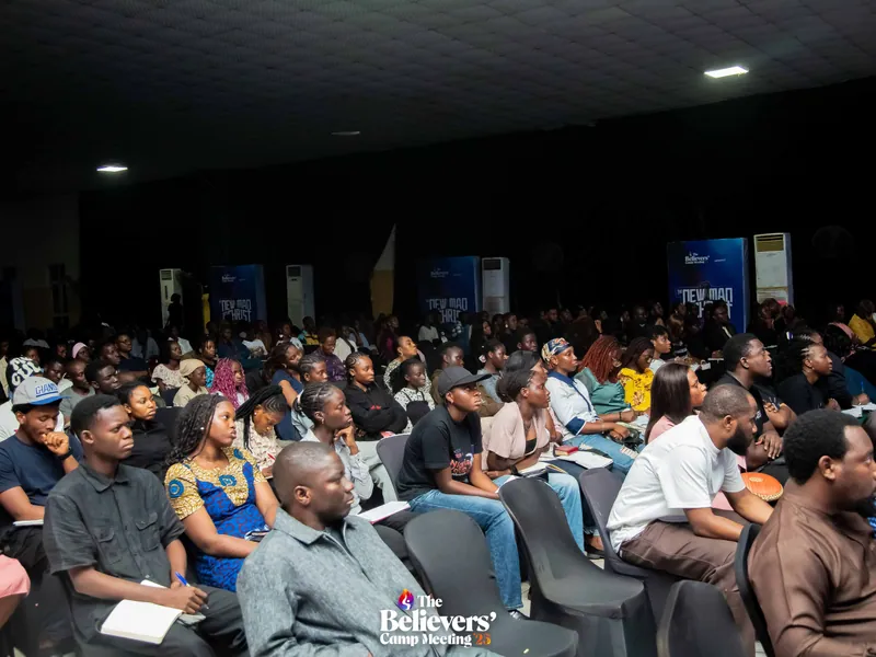 Stage lighting and atmosphere during a worship session.